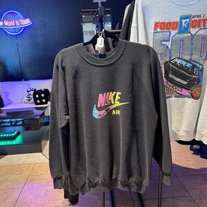 Vintage black Nike Air crew-neck sweatshirt with a colorful logo